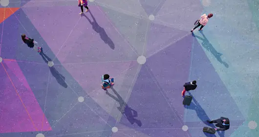 overhead view of people walking on colorful walkway