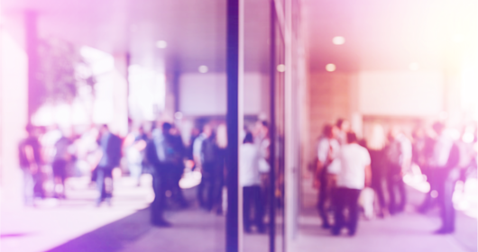 Abstract blur of people outside a building